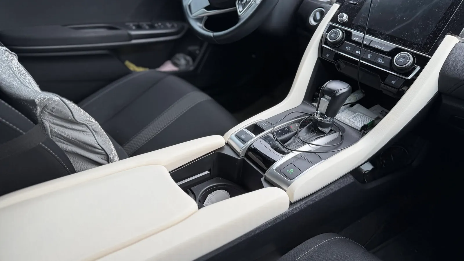Honda Civic interior with new white centre console trim fitted around the shifter