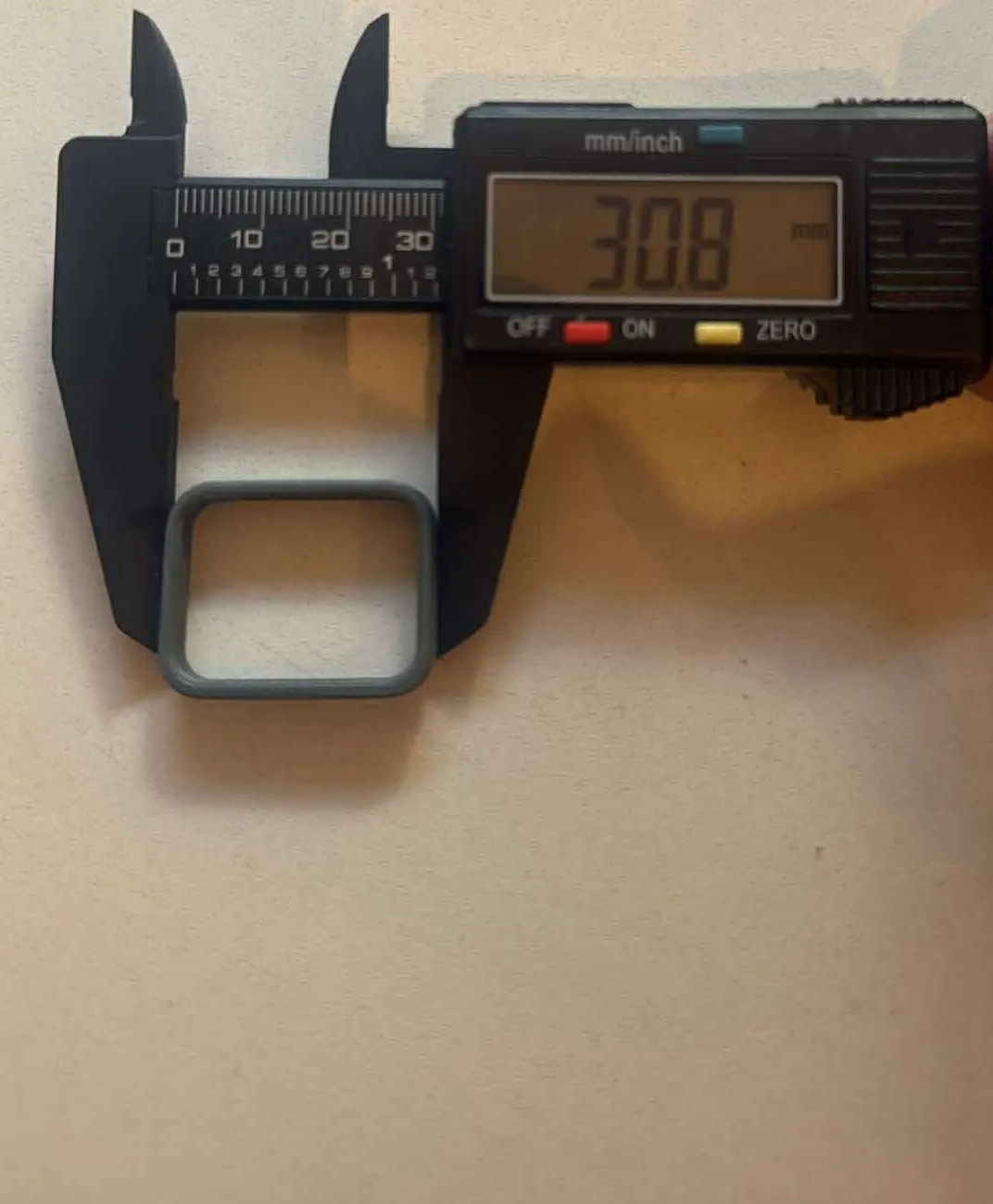Measuring a part with digital calipers for reverse engineering